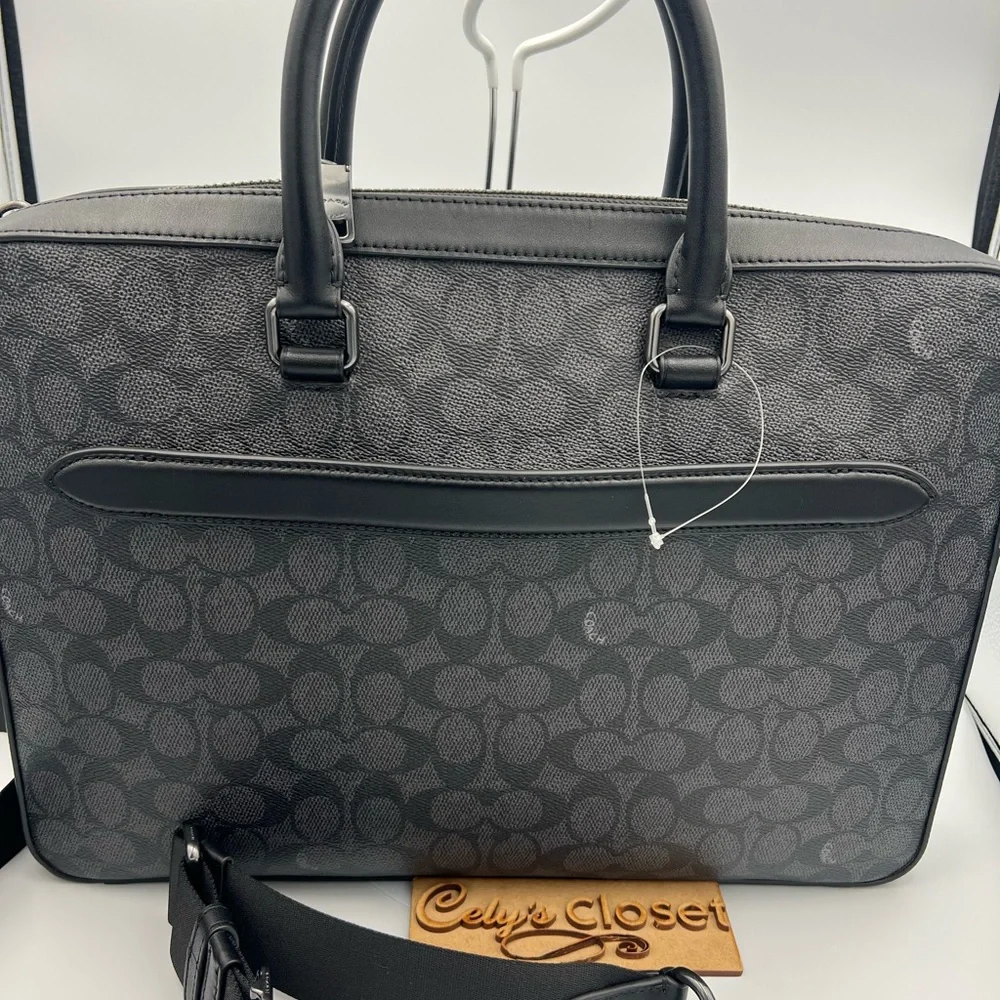 Coach Slim Brief In Signature Canvas With Trolley Sleeve